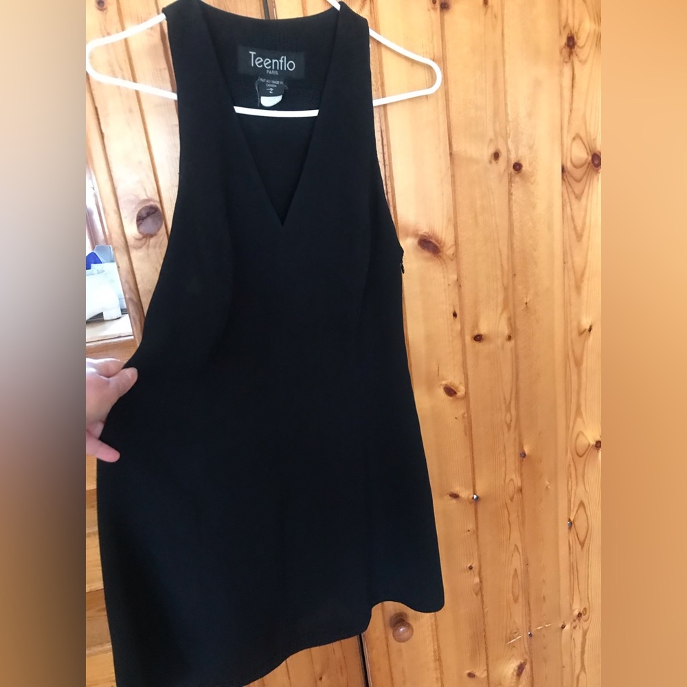 Black mini dress made in Paris size 2, flare